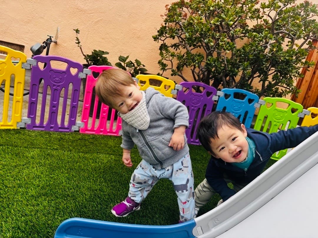 Kids playing on slide